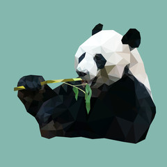 Naklejka premium polygonal panda eating bamboo, polygon animal, vector illustrati