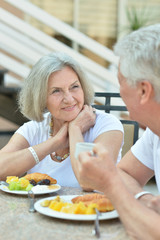 Senior couple having breakfast