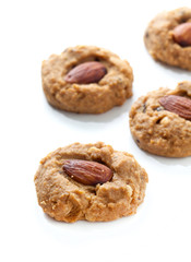Homemade almond cookies on white background