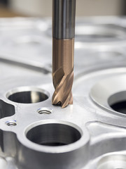 operator machining automotive parts by machining center © sorapolujjin