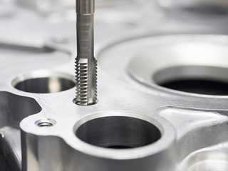 operator machining automotive parts