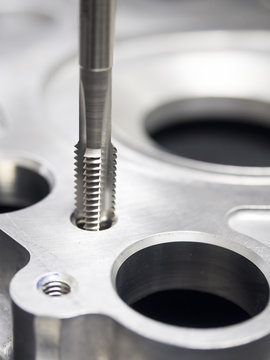operator machining automotive parts