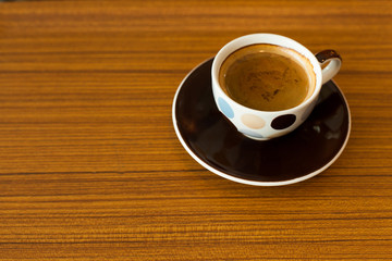 Cup of coffee espresso on wood background, morning breakfast, se