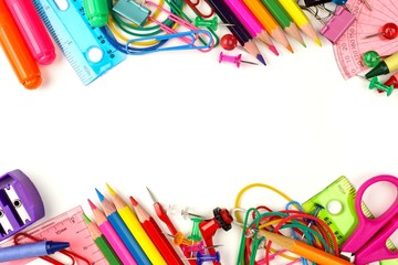 Double border of school supplies on a white background