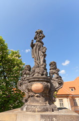 Fototapeta na wymiar Statue of St. Cajetan on Charles Bridge in Prague