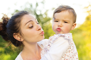 Happy mother and her baby