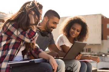 Students with laptop in Campus