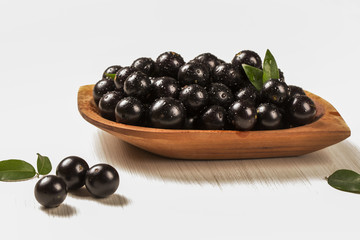 Berry Jaboticaba in bowl on white background