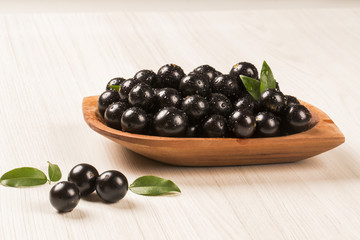 Berry Jaboticaba in bowl on white background