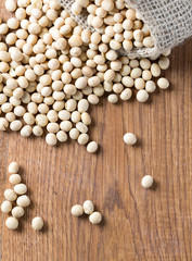 soya beans on wooden surface
