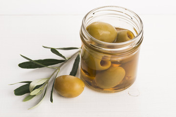 pickled olives and olive tree branch