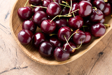 cherry in a wooden bowl