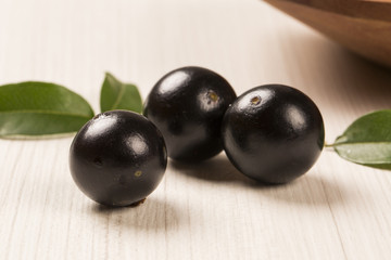 Berry Jaboticaba in bowl on white background