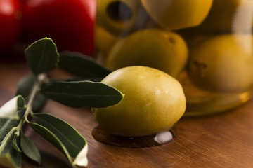 pickled olives and olive tree branch