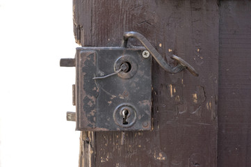 Old Door with Mortise Lock and doorknob. Background and Texture