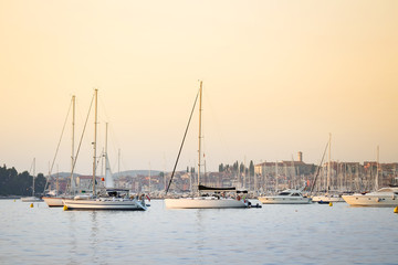 Fototapeta na wymiar Sailboats anchored at Adriatic coast