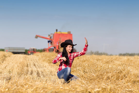 Cowgirl in wheat field
