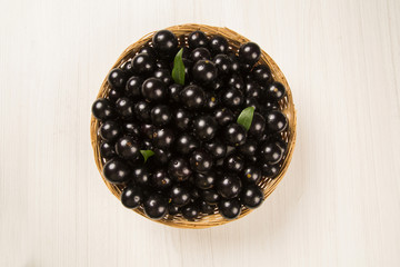Berry Jaboticaba in bowl on white background