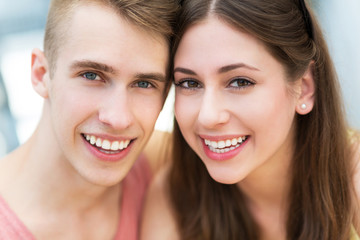 Young couple smiling
