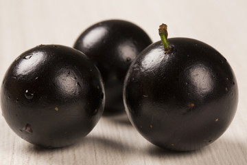 Berry Jaboticaba in bowl on white background