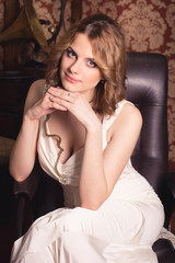 Fototapeta premium beautiful girl on a background of retro interior