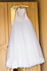 Fototapeta na wymiar wedding dress hanging 