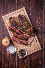 Obraz na płótnie Canvas Beef steak on a wooden background