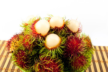 asian sweet fruit peeled rambutan isolate background