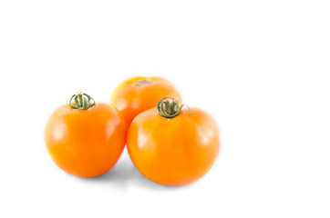 yellow tomato isolated on white