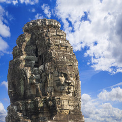 Fototapeta premium Ancient stone faces of king Jayavarman VII at The Bayon temple,