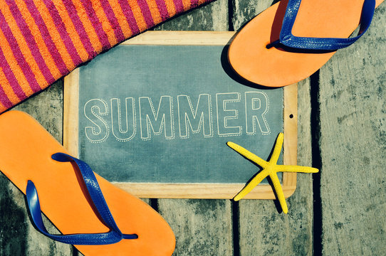 flip-flops, starfish and chalkboard with the word summer