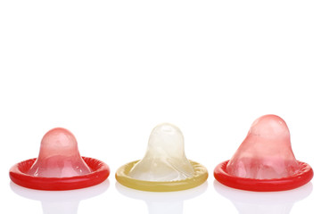 one yellow and two red condoms