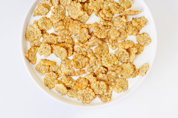 bowl with breakfast cereals soaked in milk