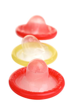 one yellow and two red condoms