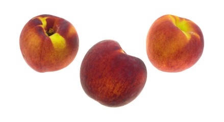 Three organic peaches