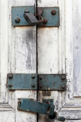 padlock on old closed door
