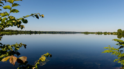 symmetric reflections on calm lake