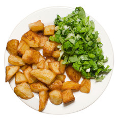 Fried potatoes and green salad