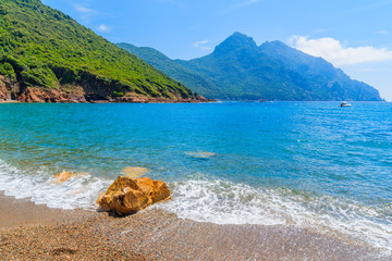 Beautiful secluded beach with azure sea water near Girolata bay, Corsica island, France