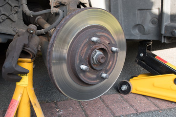 Worn Car Brake Disk  brake caliper removed