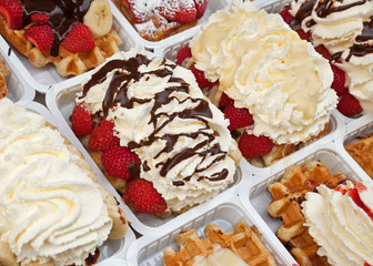 Strawberry Waffles with Cream and Chocolate Sauce