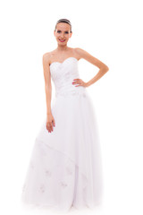 Fototapeta na wymiar Full length bride in white wedding gown isolated