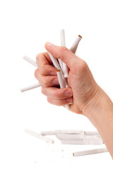 a man's arm are thrashing many cigarettes