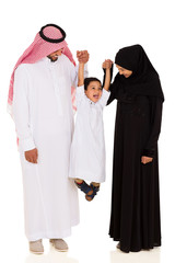 young muslim family having fun