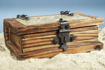 A wooden chest on the beach