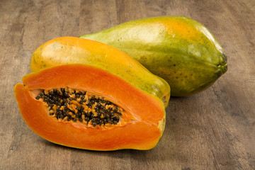 Fresh cut juicy tropical papaya mamao fruit with seeds at Brazil