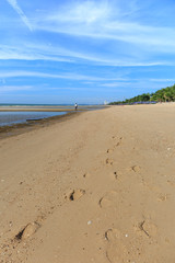 Footprints of man on sand at Cha-am beach in Phetchaburi, Thaila