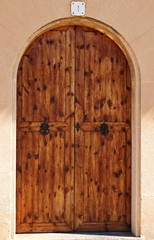 Oval wooden doors