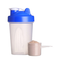 Shaker and cup of protein powder isolated on white background