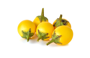 yellow eggplant with stem on white background